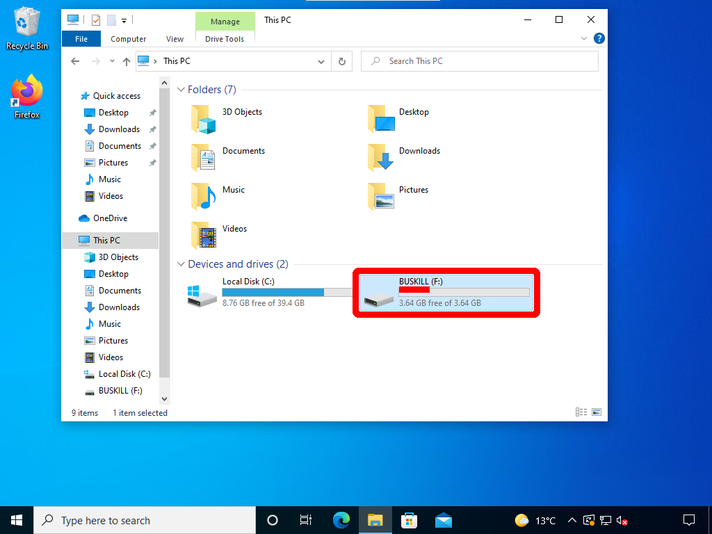 screenshot shows the USB Drive under "This PC" is named "BUSKILL"